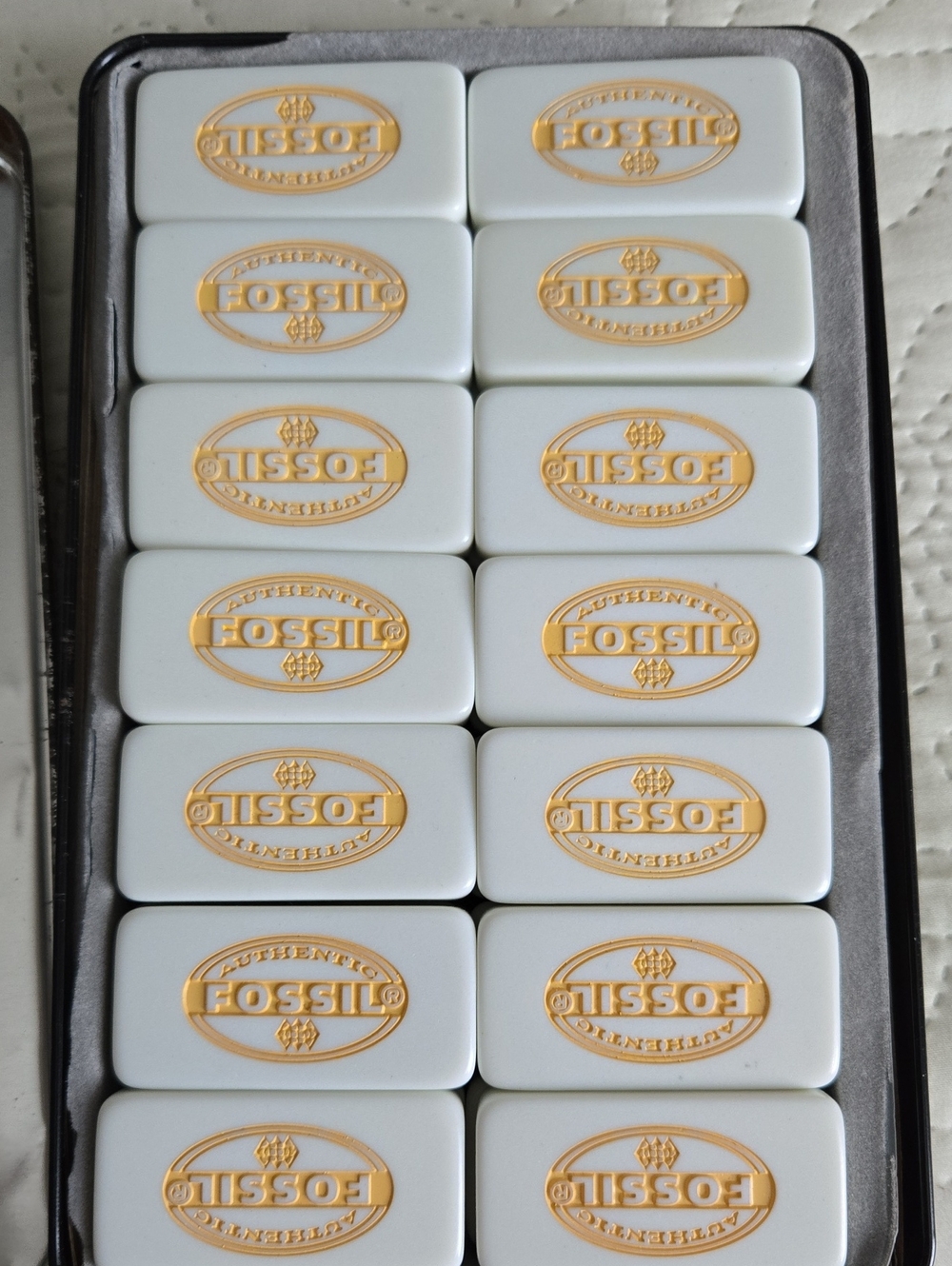 Fossil White Domino Set with Gold Logos